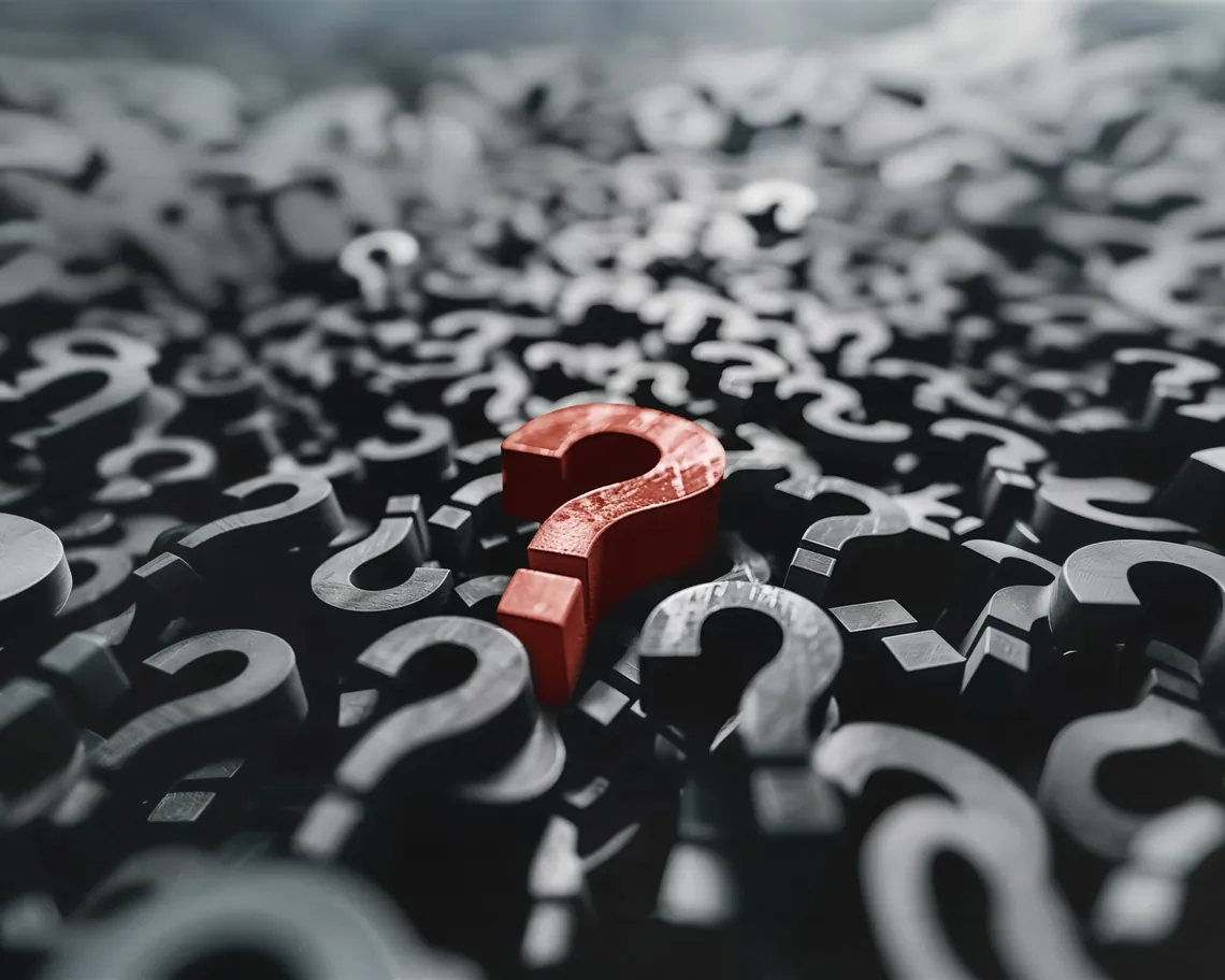 Red question mark among grey question marks